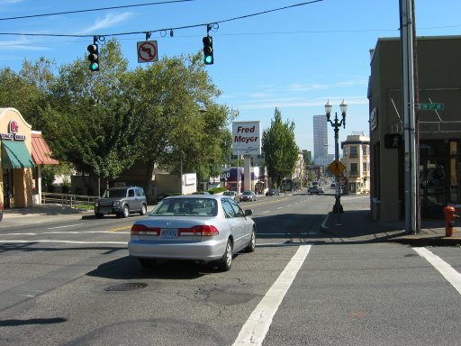 [NW 21st Ave & W Burnside St looking east]