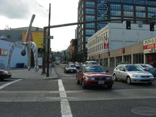 [SW 10th Ave & W Burnside St looking west]